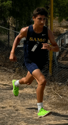 Asher Zaczepinski racing in a Santa Monica High School cross country jersey